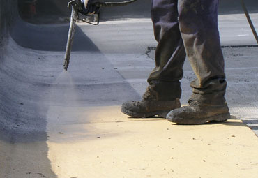Coating systems over Grand Prairie spray foam roof systems